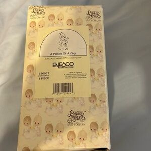 Precious Moments figurine.